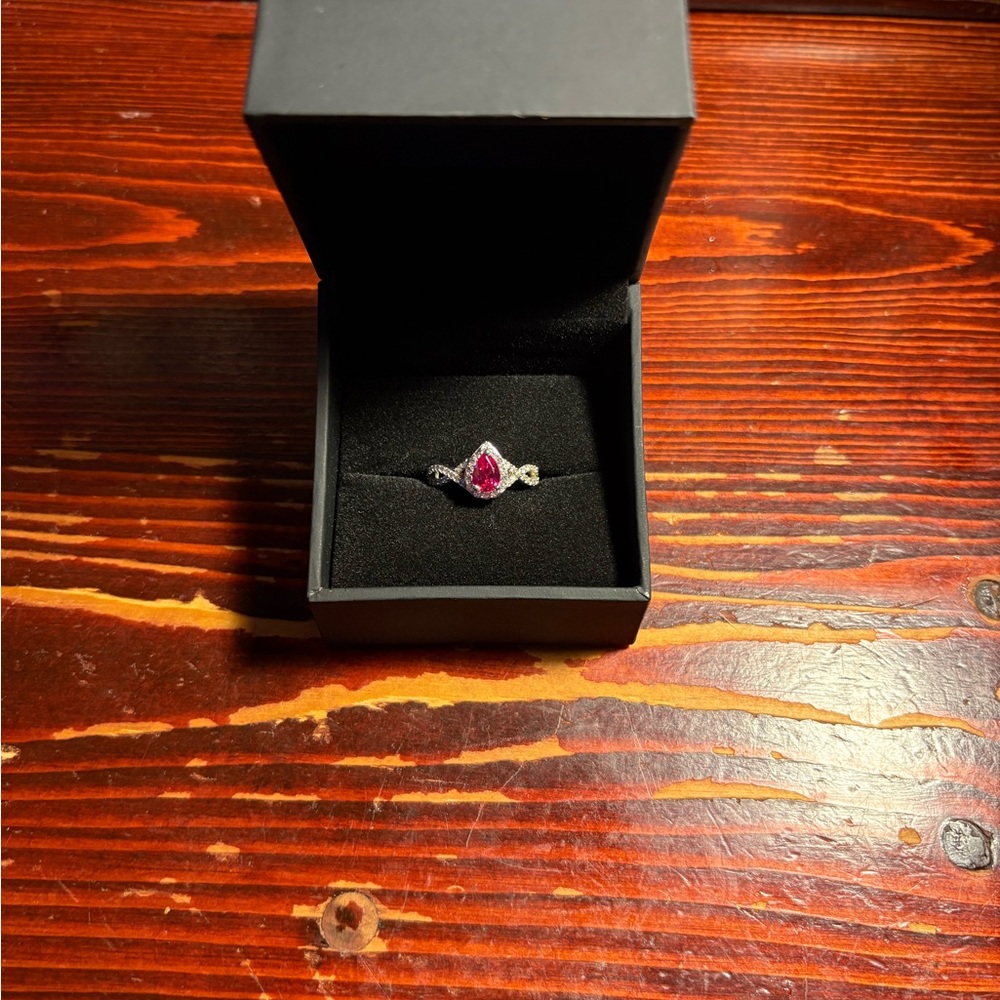 Elegant Silver and Ruby pear cut Ring